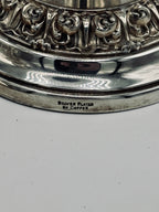Paire de bougeoirs en métal argenté